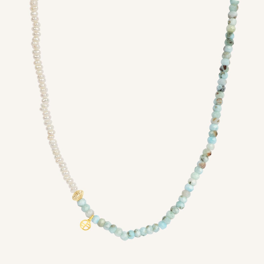 Necklace with small beads on a white background