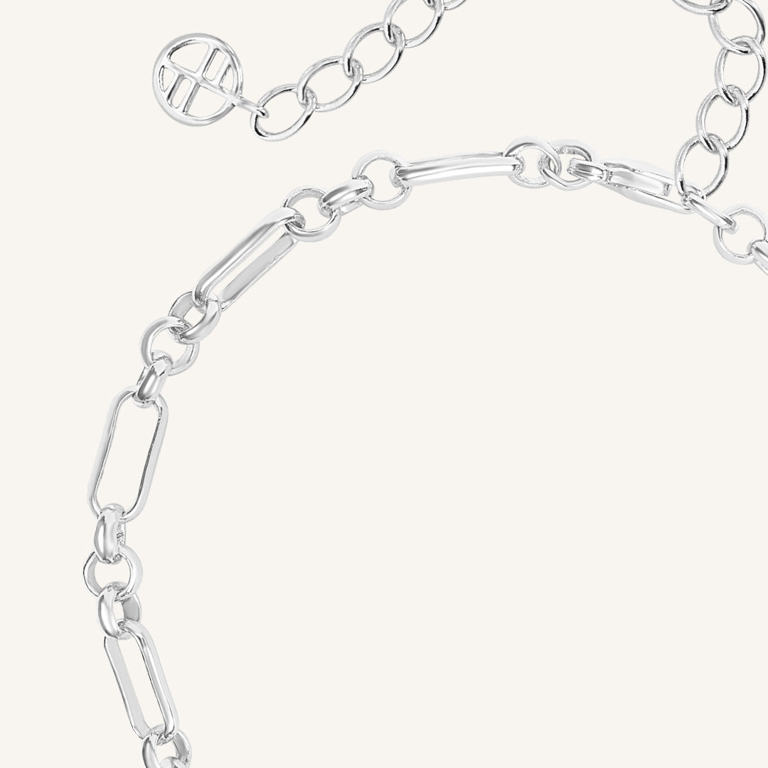 Silver chain bracelet on a white background