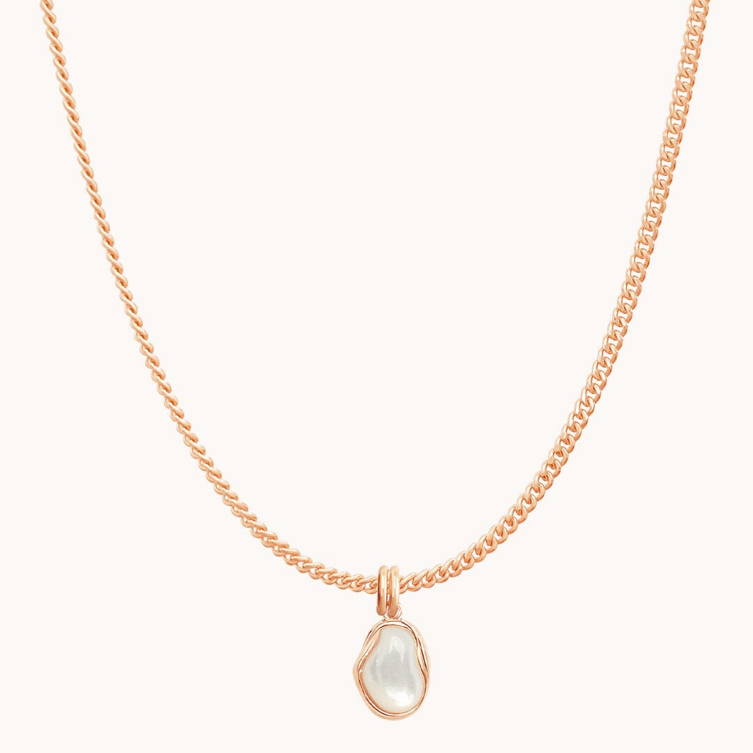 Rose gold necklace with a teardrop-shaped pendant on a white background