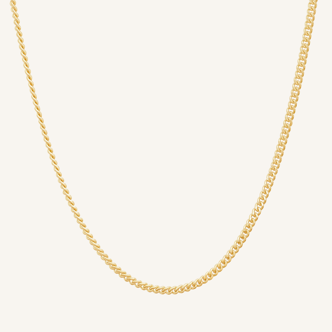 A gold-colored curb chain necklace with a length of 50cm.