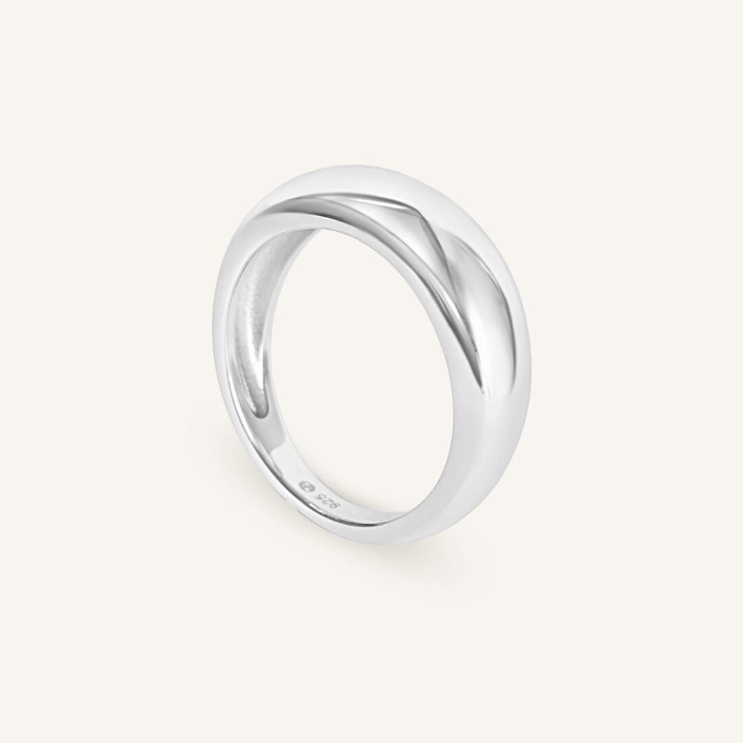 Silver ring on a white background