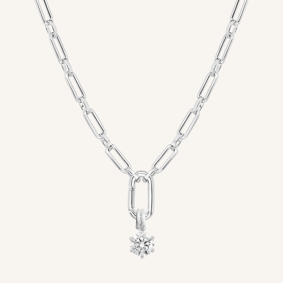 Round, silver, cubic zirconia charm on gold chain