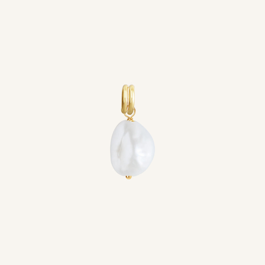 A single Keshi pearl charm with gold findings, displayed against a white background.