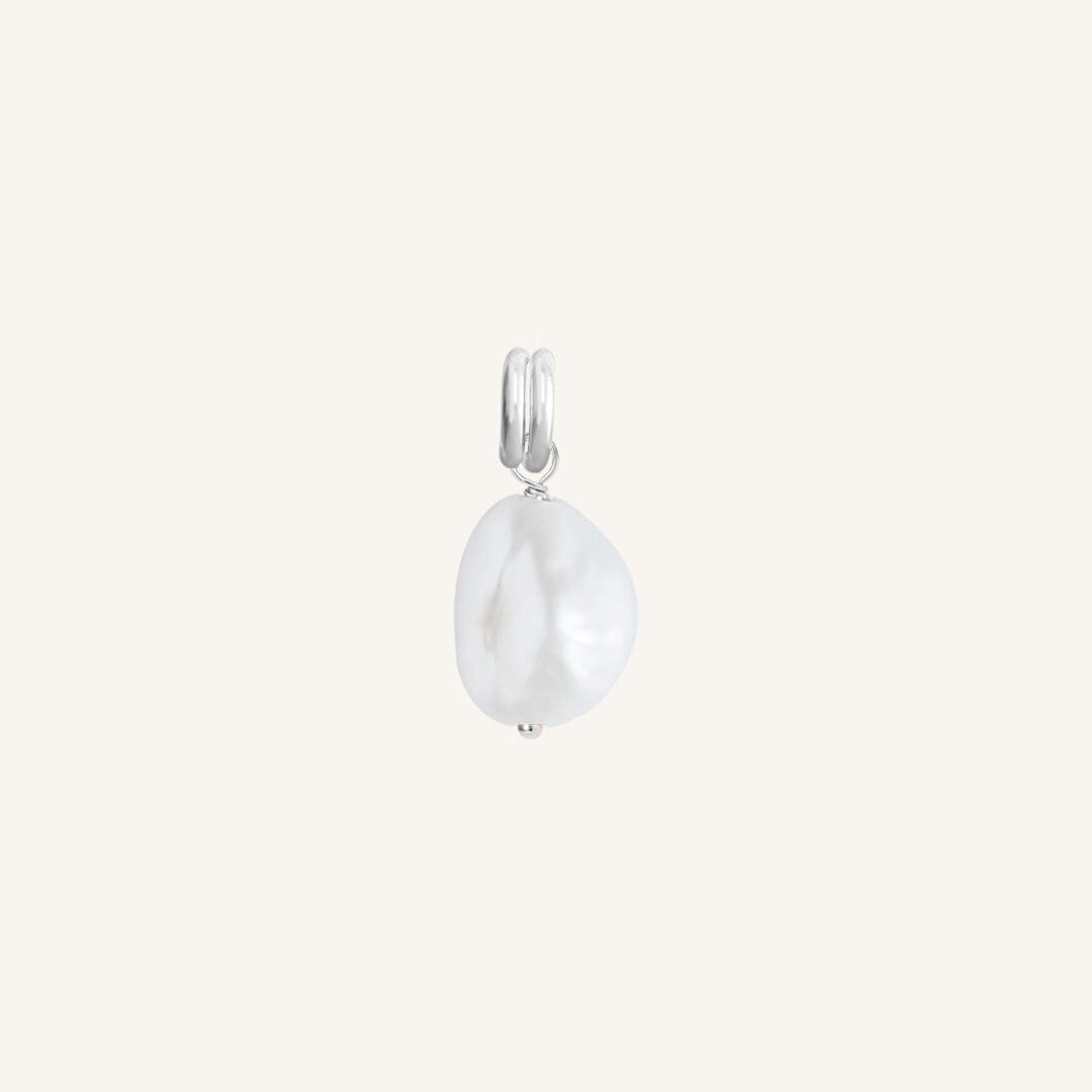 A single Keshi pearl charm with silver findings, displayed against a white background.