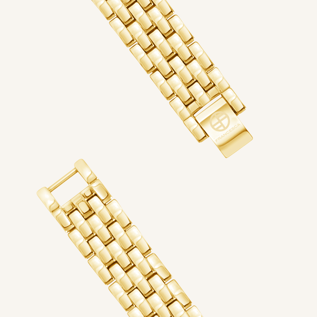 A luxurious gold-coloured metal watch band