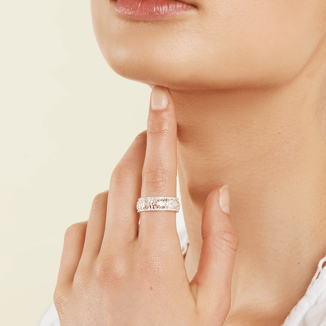 intricately designed statement silver ring inspired by Paris on finger