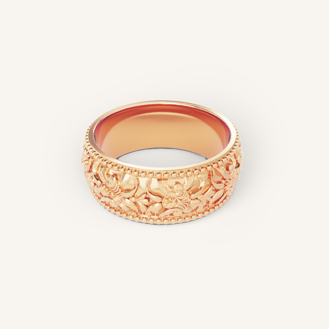 intricately designed statement rose gold ring inspired by Paris on white background