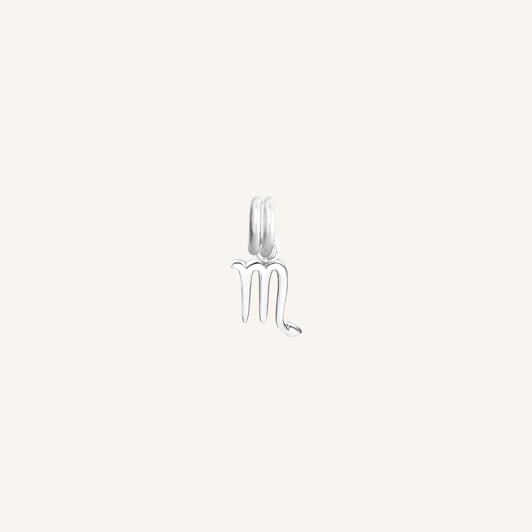 A silver-coloured Petite Zodiac Charm representing the Scorpio sign.