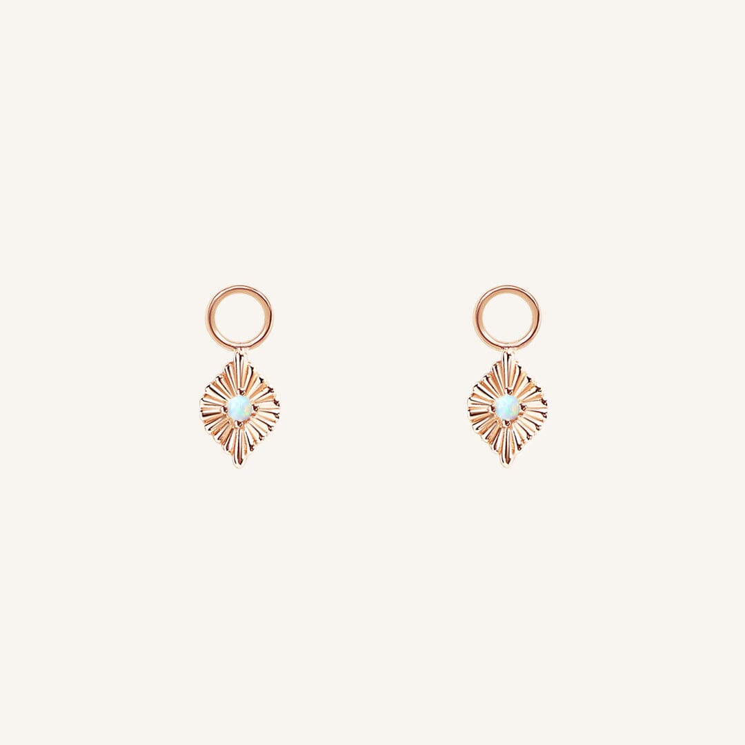 A pair of rose diamond shaped hoop charms featuring a faux opal