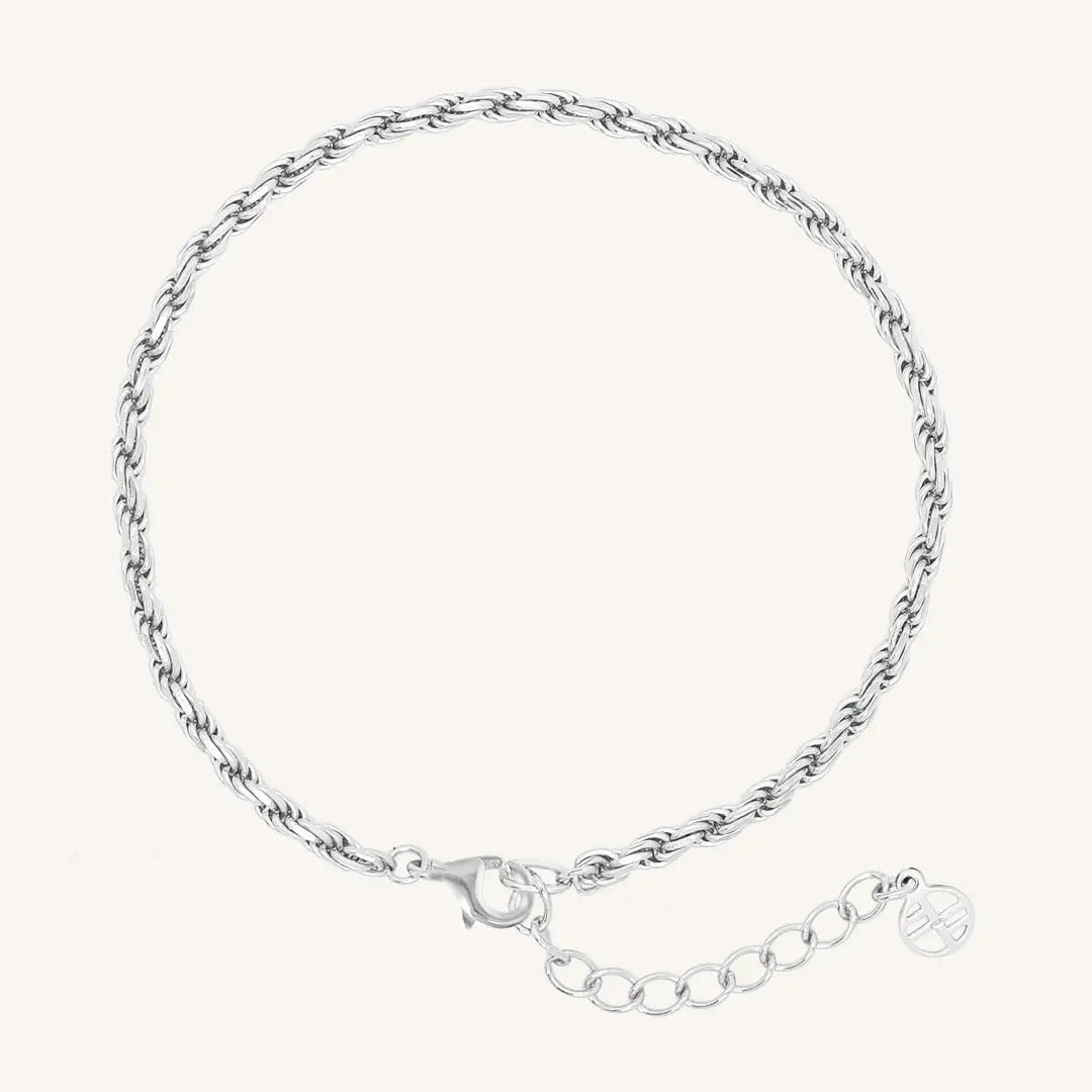 A silver-tone rope bracelet with a extender chain.