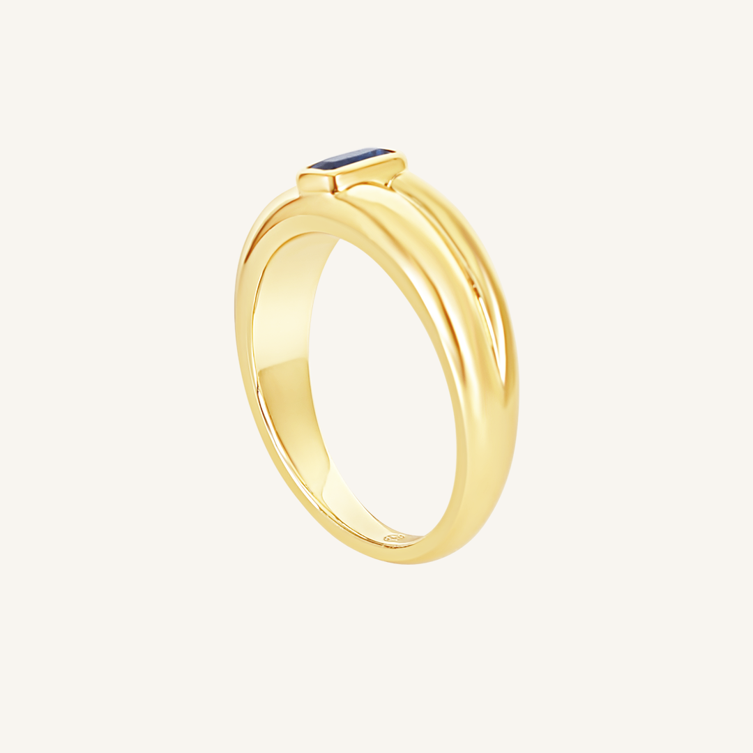 Gold ring with Navy blue cubic zirconia bezel set Inspired by the halls of Versailles on white background