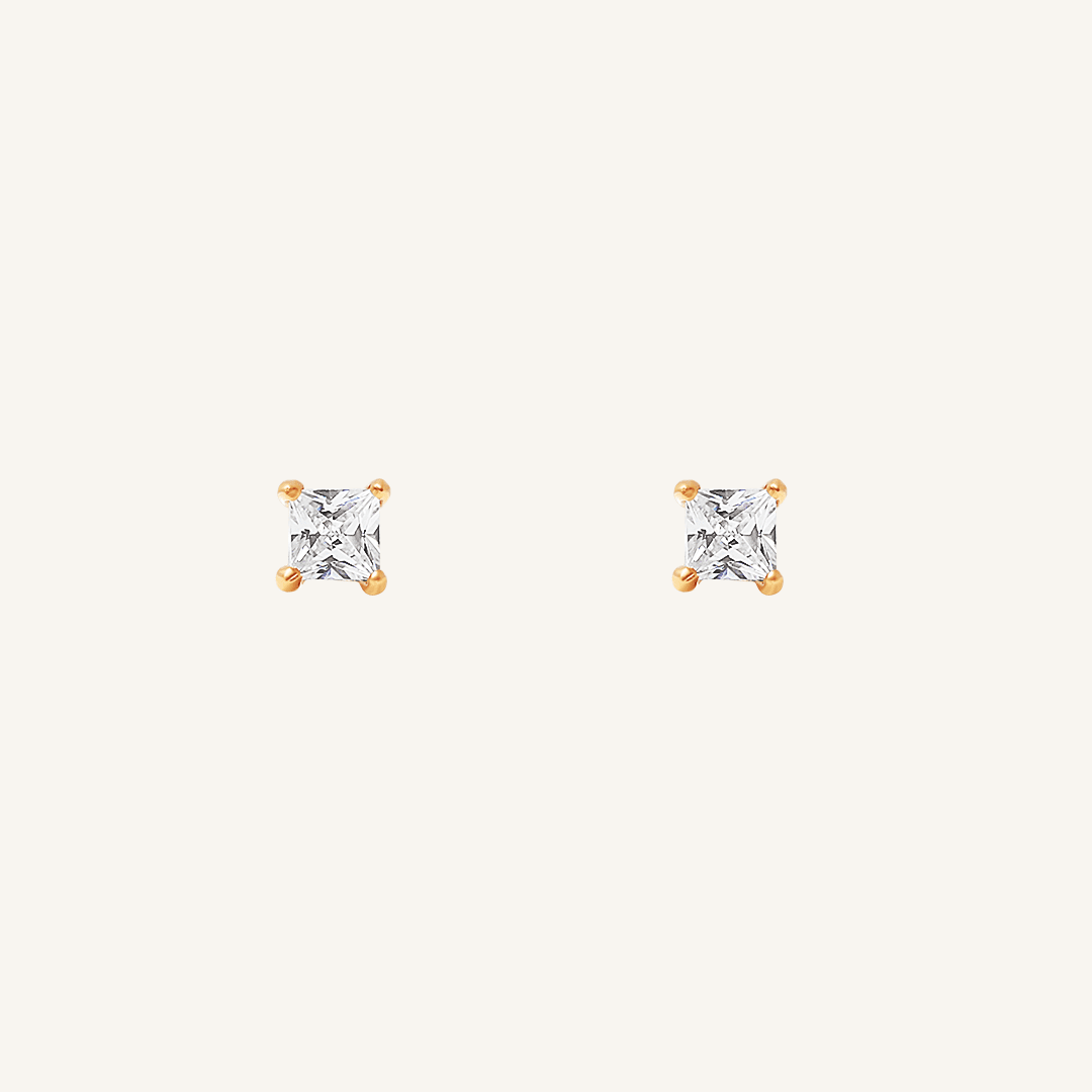 Pair of square cubic zirconia stud earrings on a white background