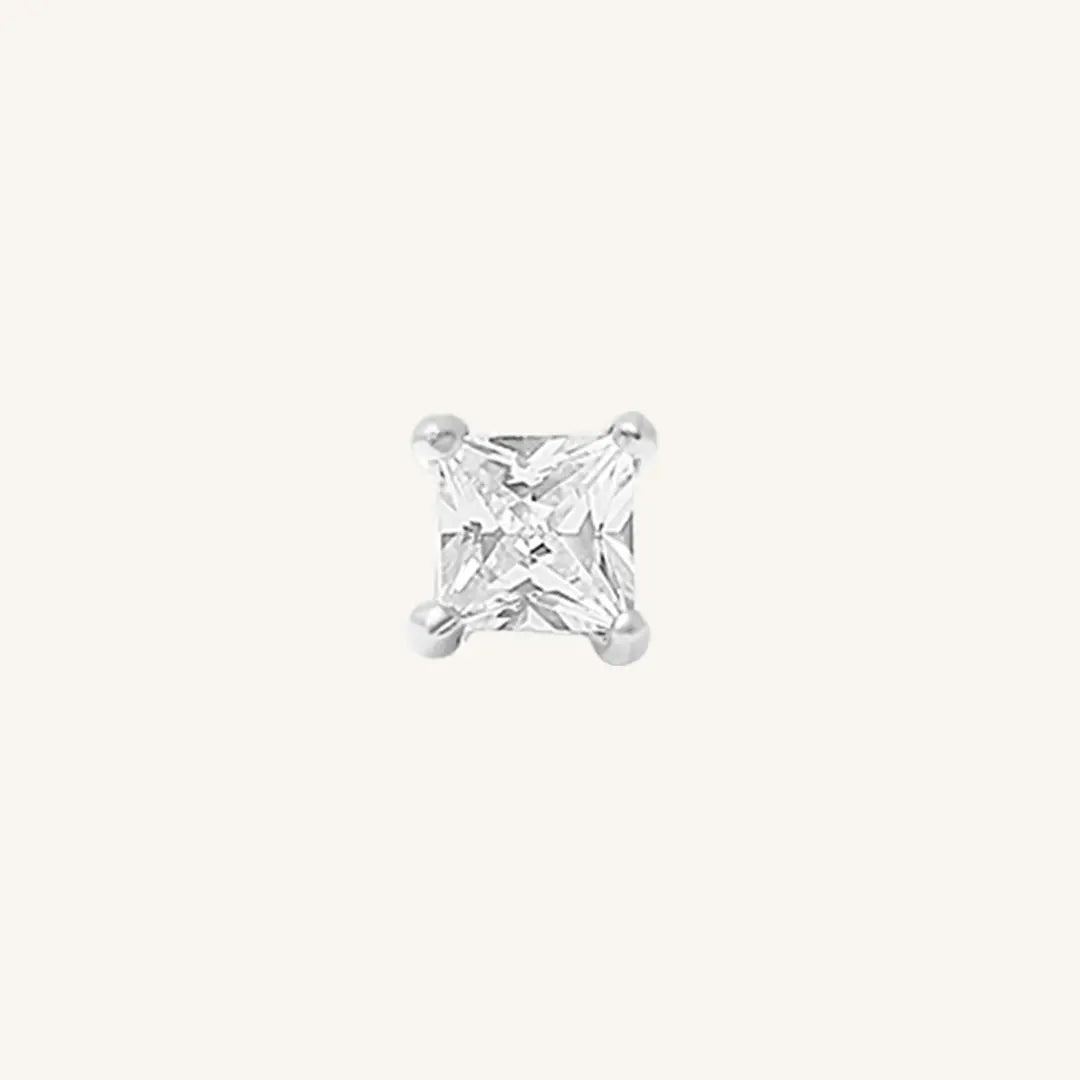Pair of square cubic zirconia stud earrings on a white background