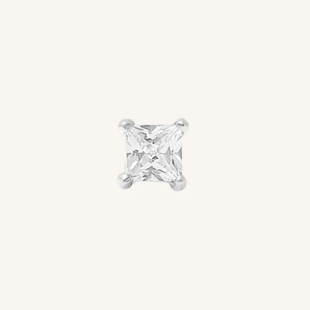 Pair of square cubic zirconia stud earrings on a white background