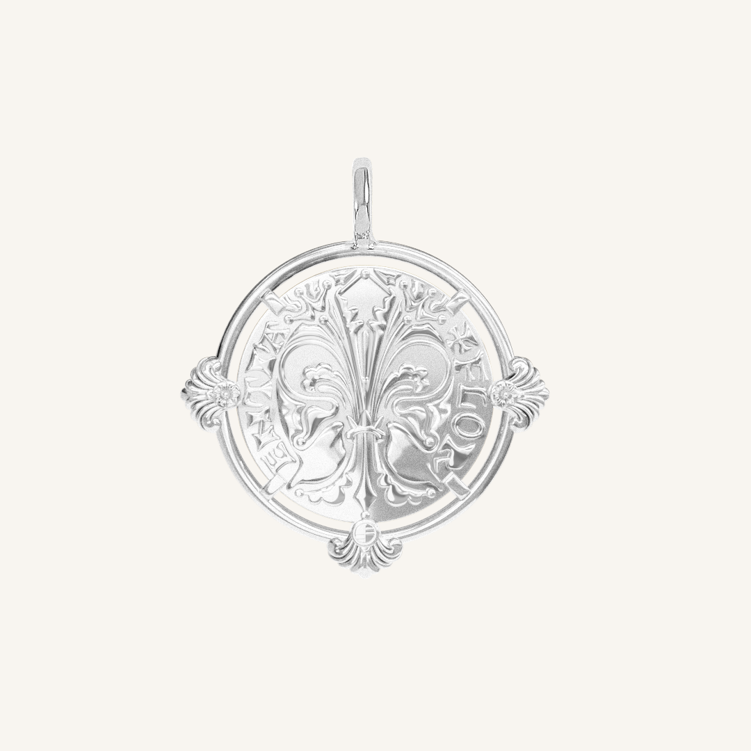 silver pendant featuring intricate patterns inspired by Palace of Versailles on a plain background