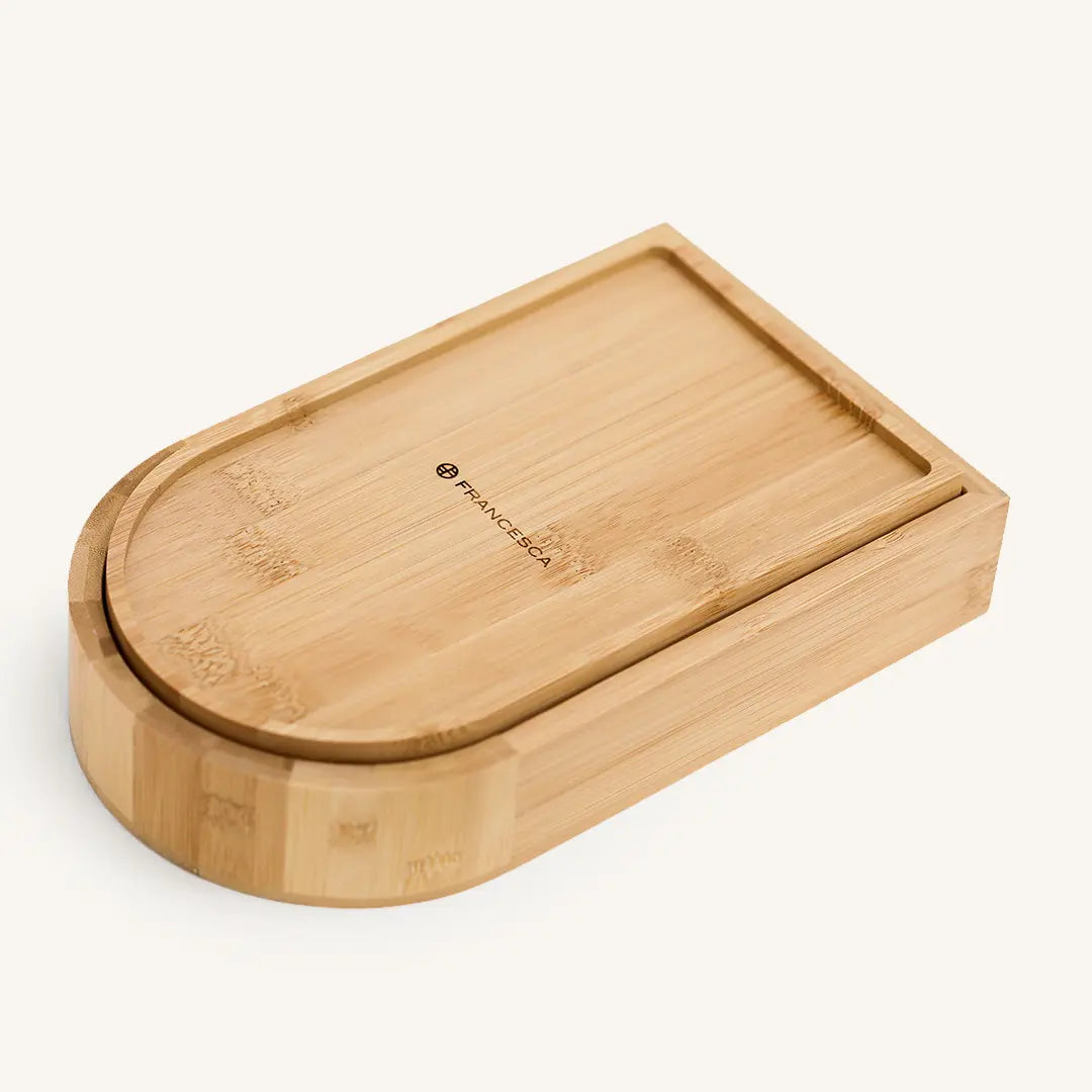 A wooden jewellery box with a lid, featuring a mirror on the inside lid, with the brand name 'Francesca' visible.