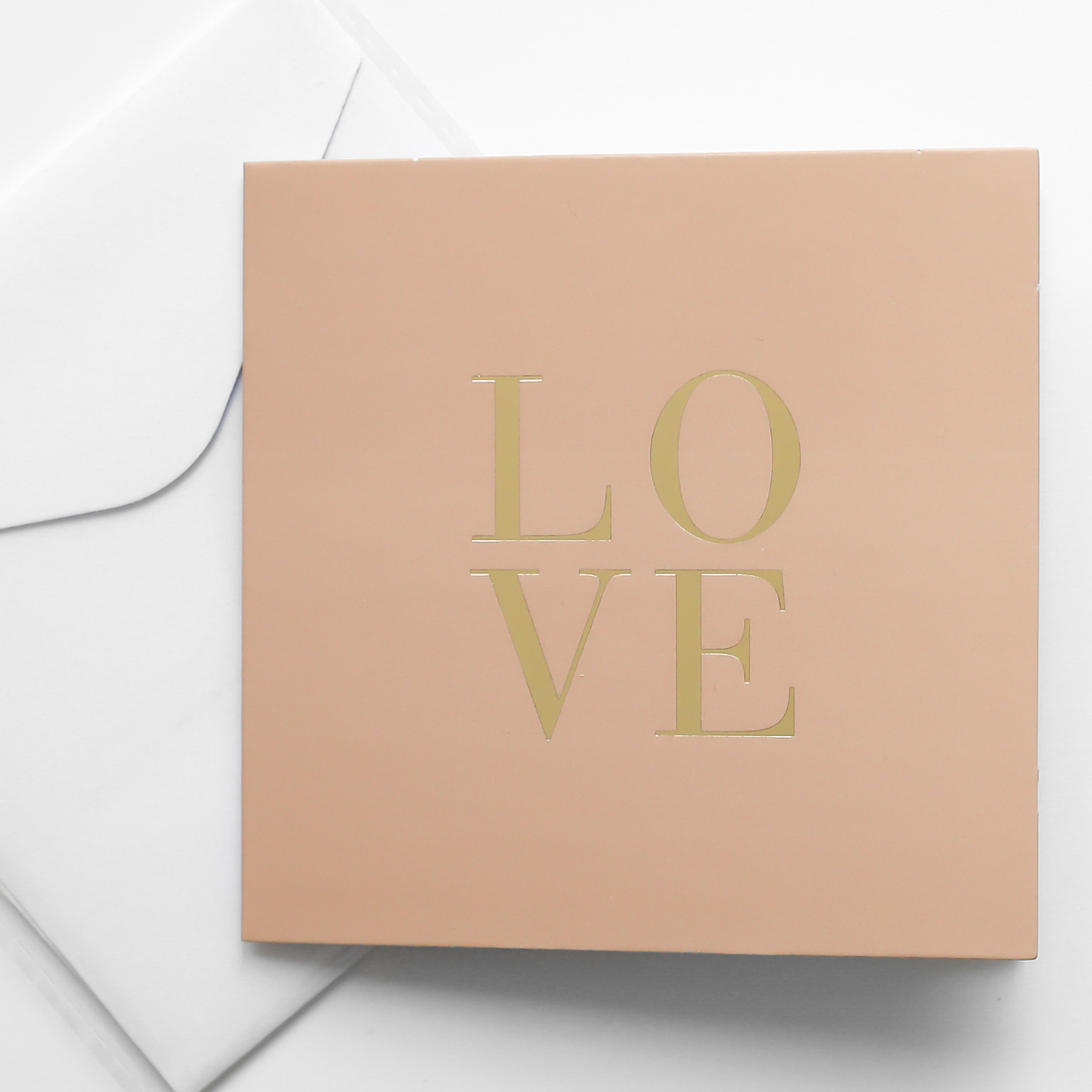 A greeting cards displayed on a neutral background, featuring designs such as 'love'.