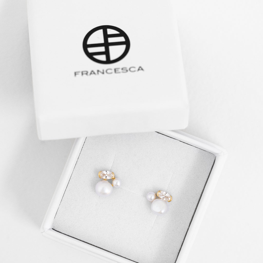 Pia pearl studs in white box