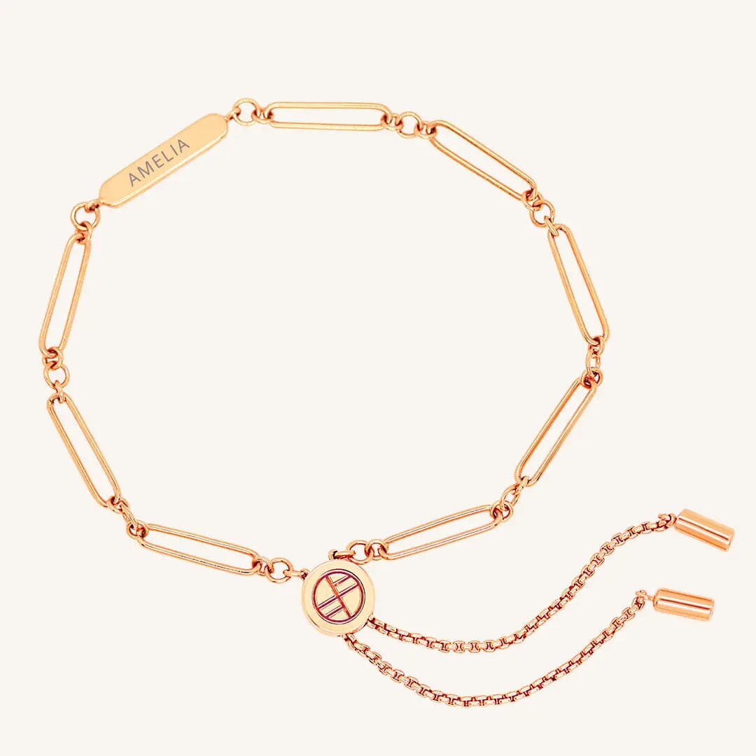 A rose chain bracelet with an adjustable fastening design and an engraveable panel.