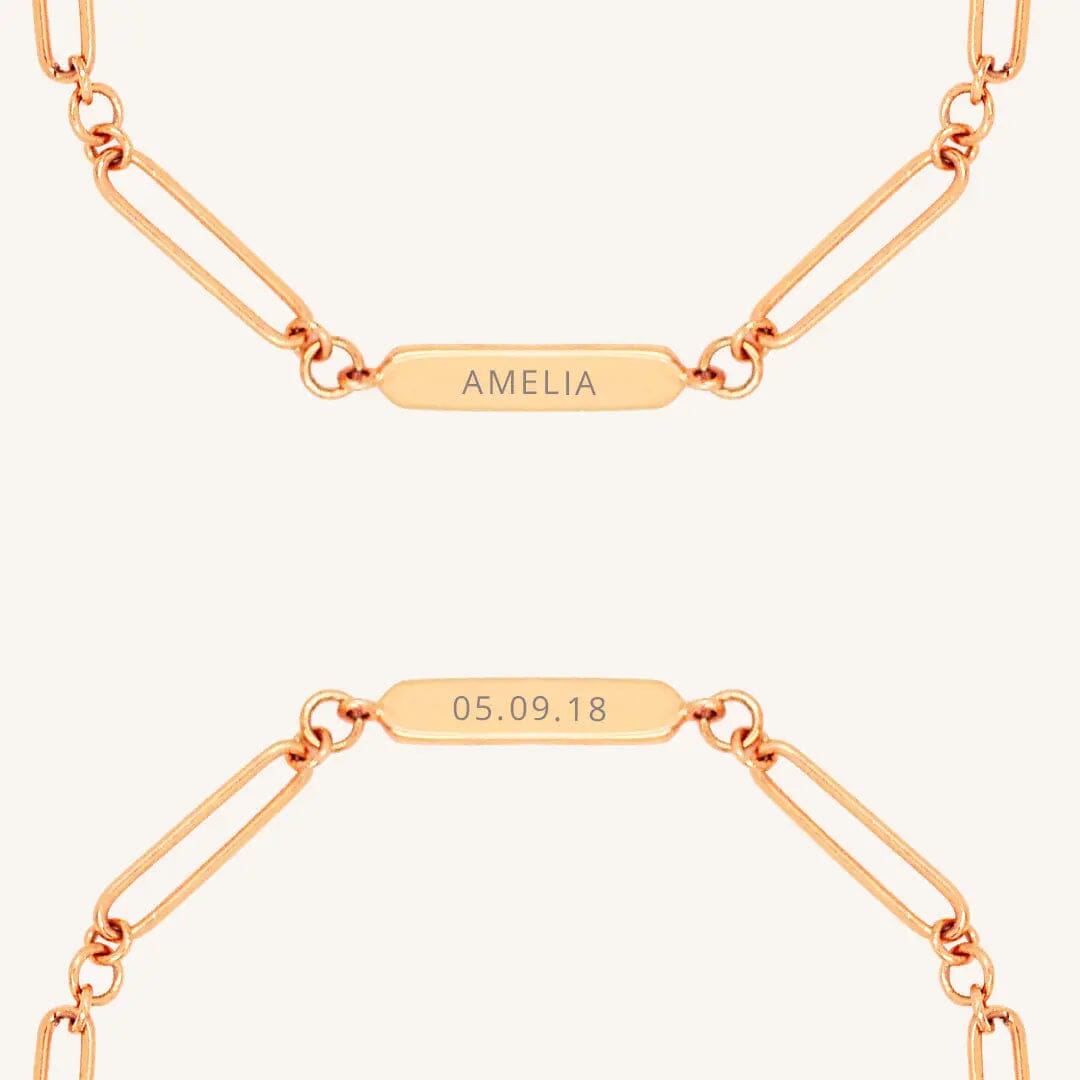A rose chain bracelet with an engraveable panel.
