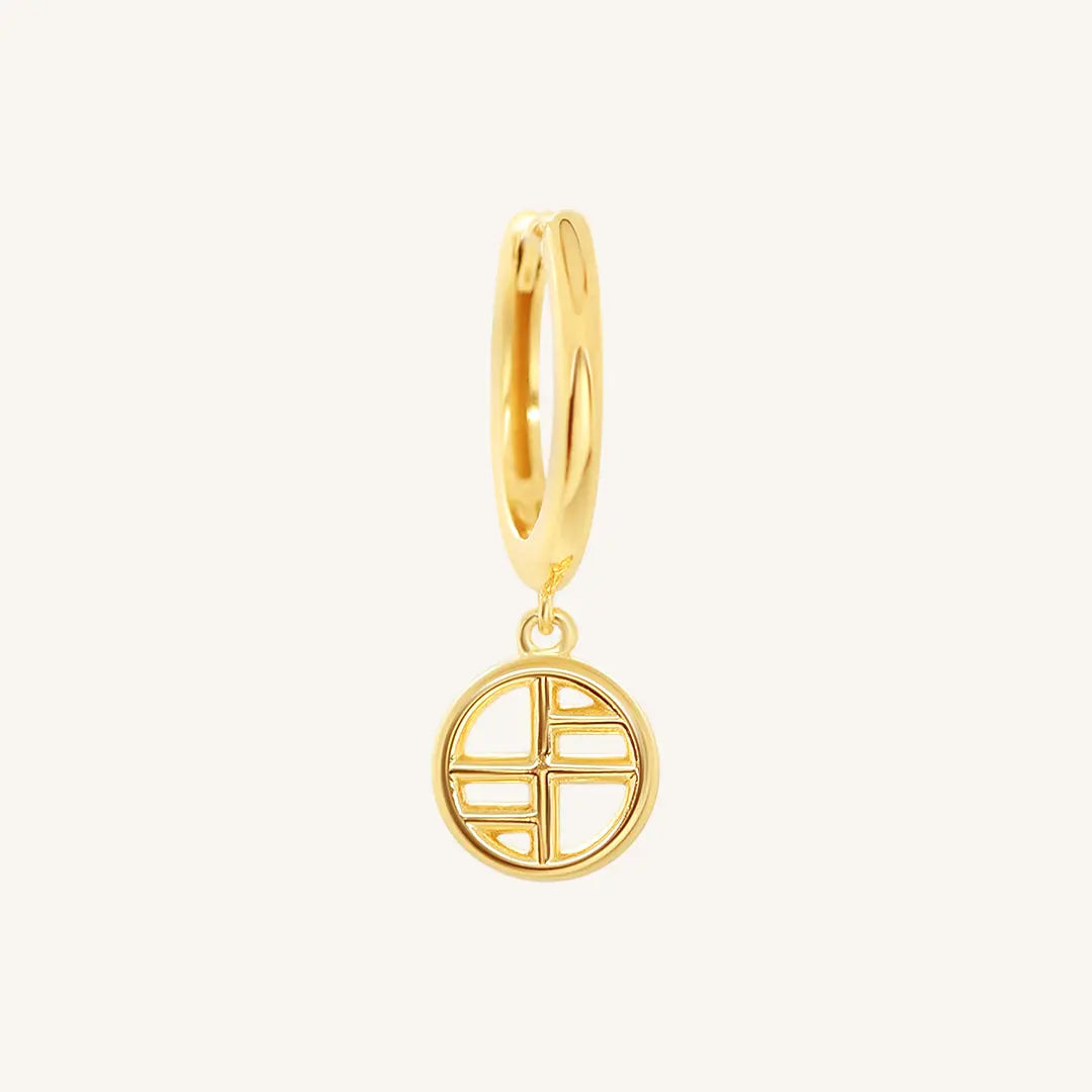 A gold-tone drop earring with the francesca logo