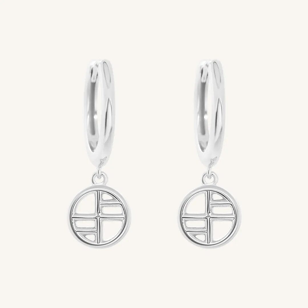 A pair of silver-tone drop earrings with the francesca logo