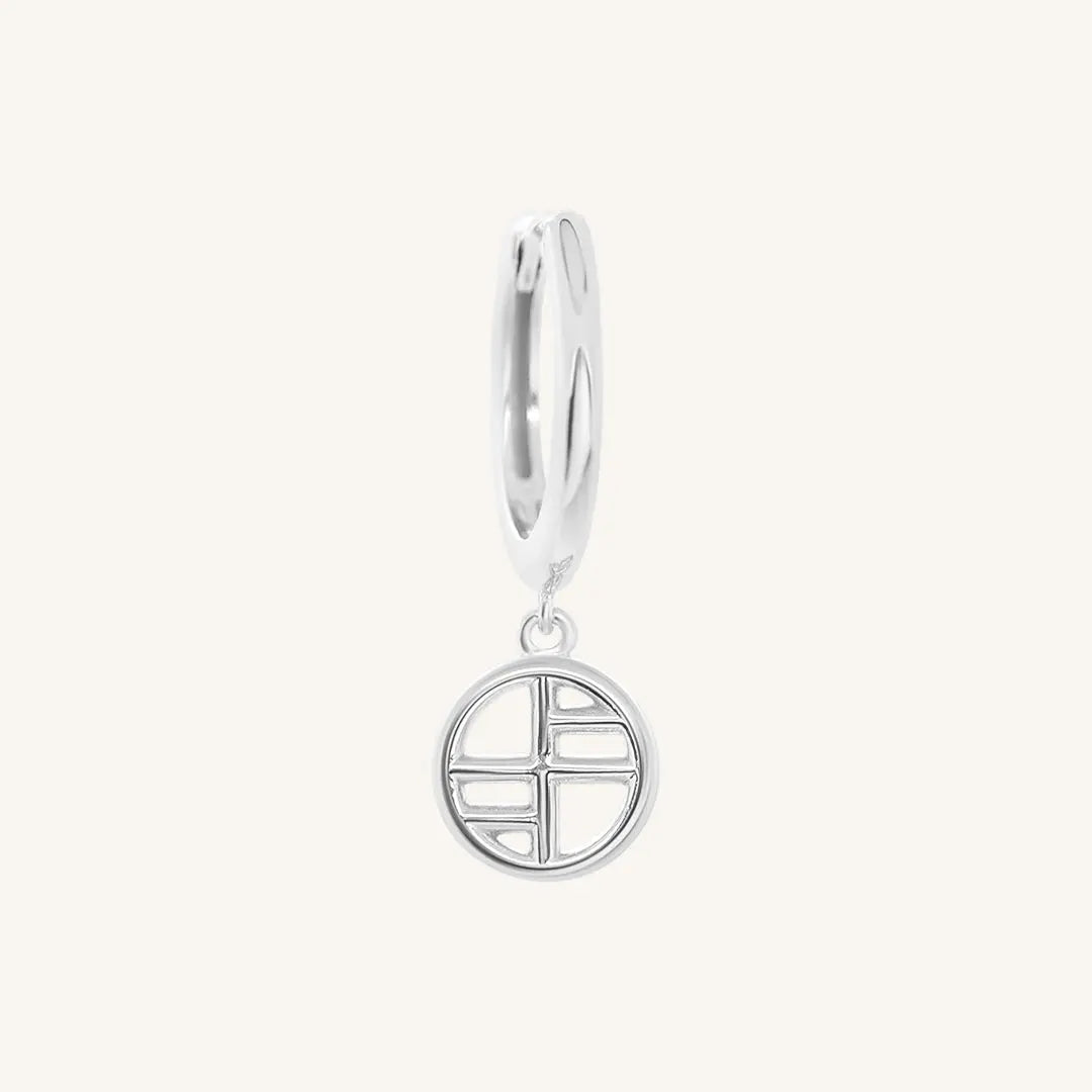 A silver-tone drop earring with the francesca logo