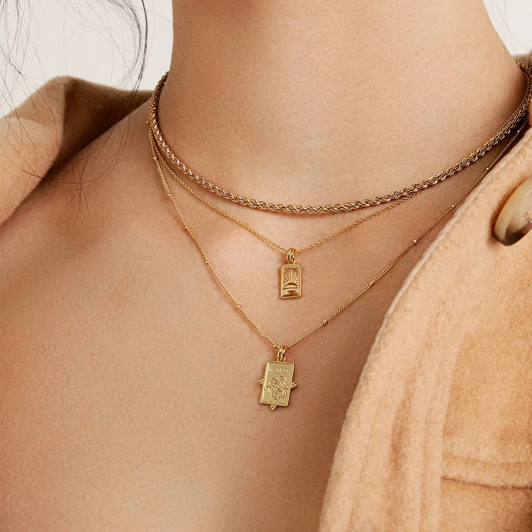 Wander Charm - WANDER-CHARM-WORN.jpg