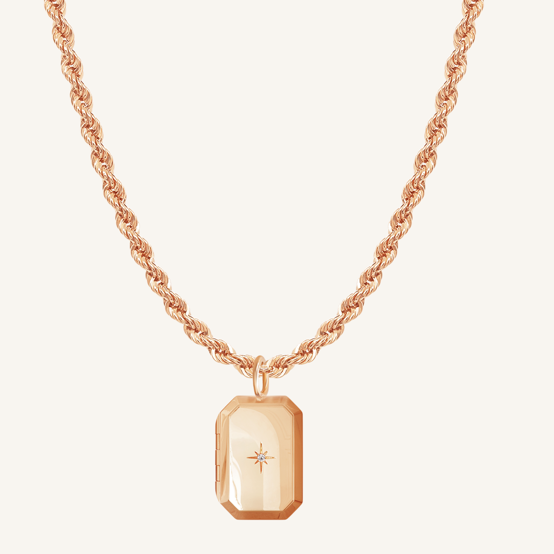 Rose Bevel Locket on rope chain on white background