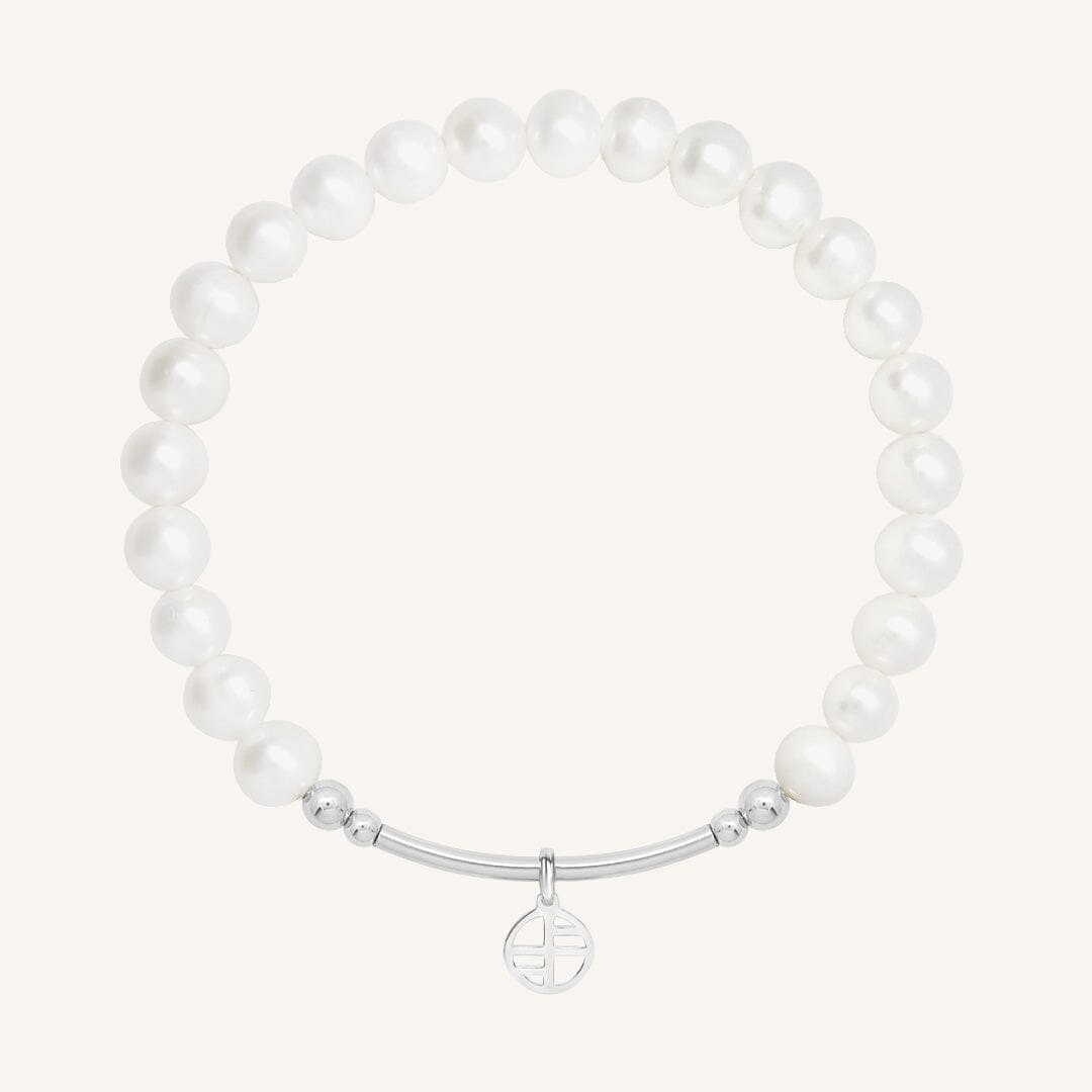 Pearl bracelet with a silver clasp on a white background