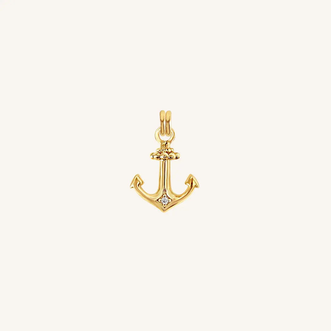 The  GOLD  Anchor White Stone Charm by  Francesca Jewellery from the Charms Collection.