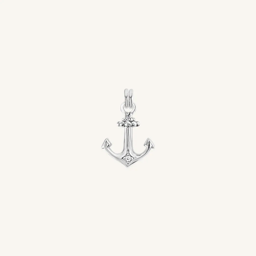 The  SILVER  Anchor White Stone Charm by  Francesca Jewellery from the Charms Collection.