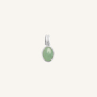 Silver pendant with a green stone on a white background