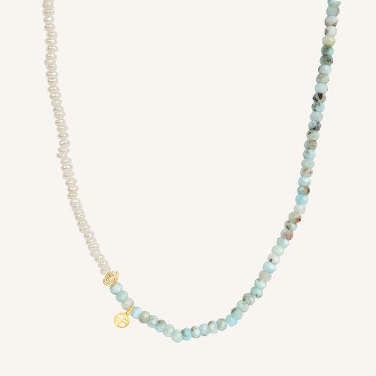 Necklace with small beads on a white background