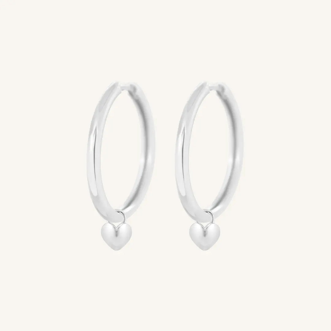 The  SILVER-Riley  Behold Plain Hoops by  Francesca Jewellery from the Earrings Collection.