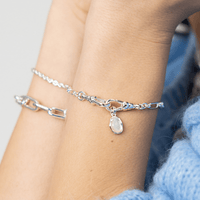 Silver chain bracelet on a white background