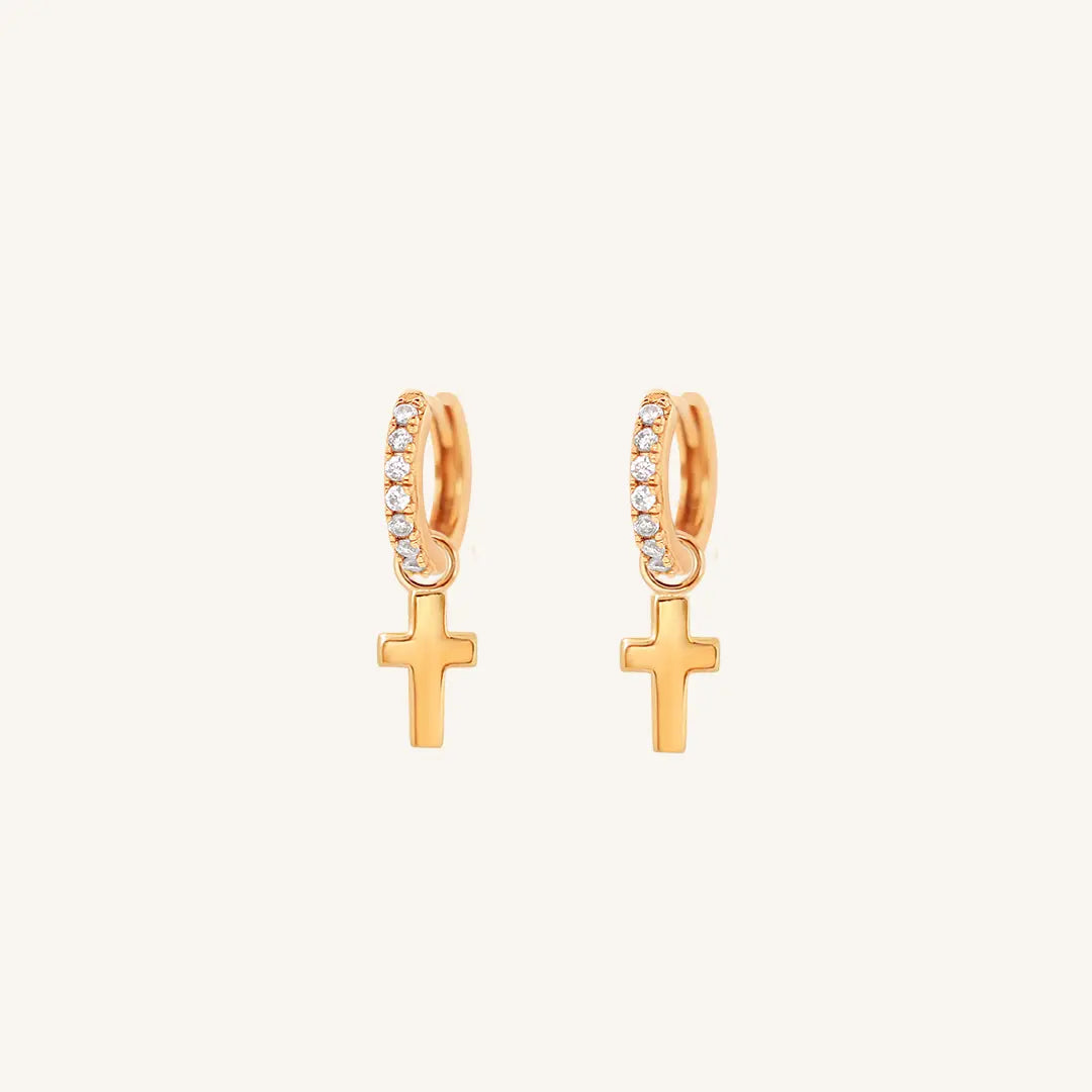 The  ROSE-Darcy  Cross Crystal Hoops by  Francesca Jewellery from the Earrings Collection.