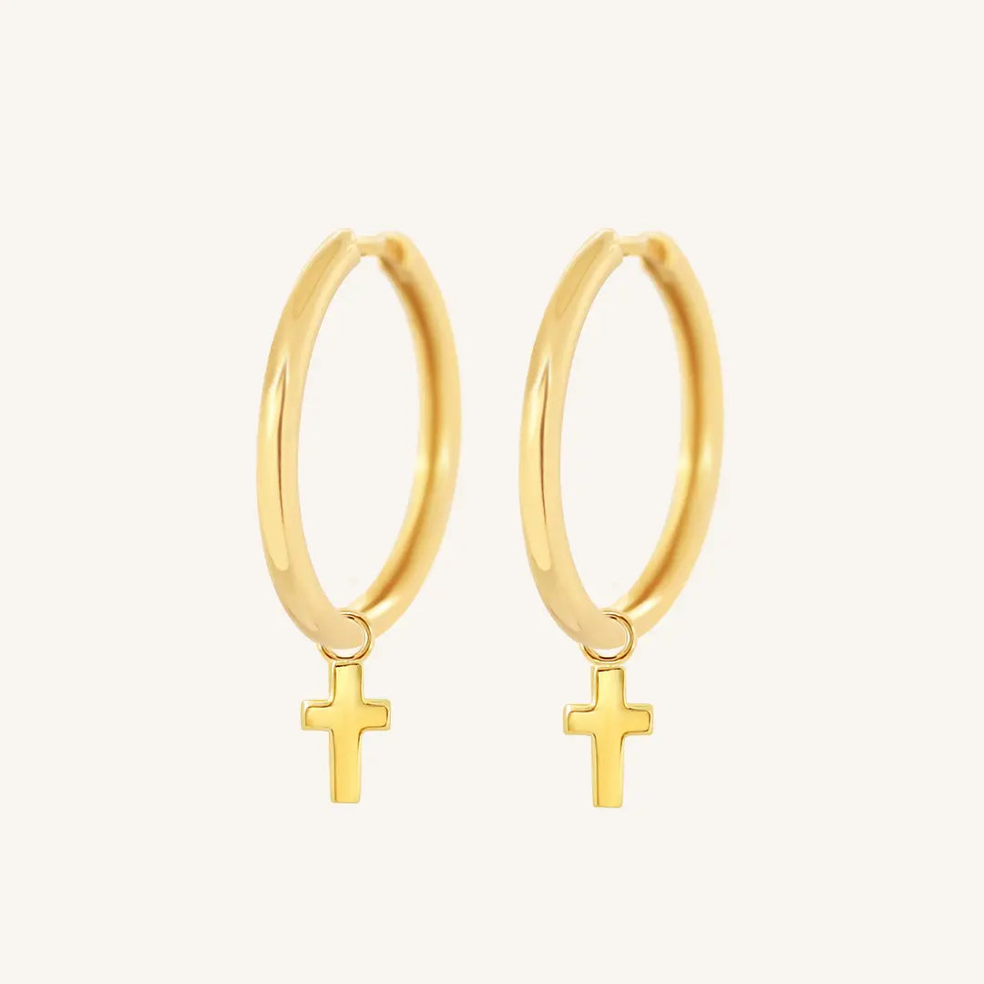The  GOLD-Riley  Cross Plain Hoops by  Francesca Jewellery from the Earrings Collection.