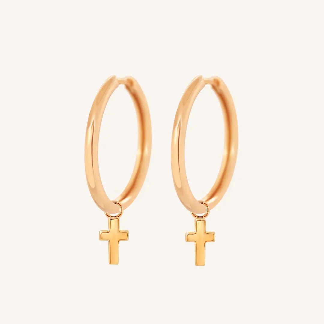 The  ROSE-Riley  Cross Plain Hoops by  Francesca Jewellery from the Earrings Collection.