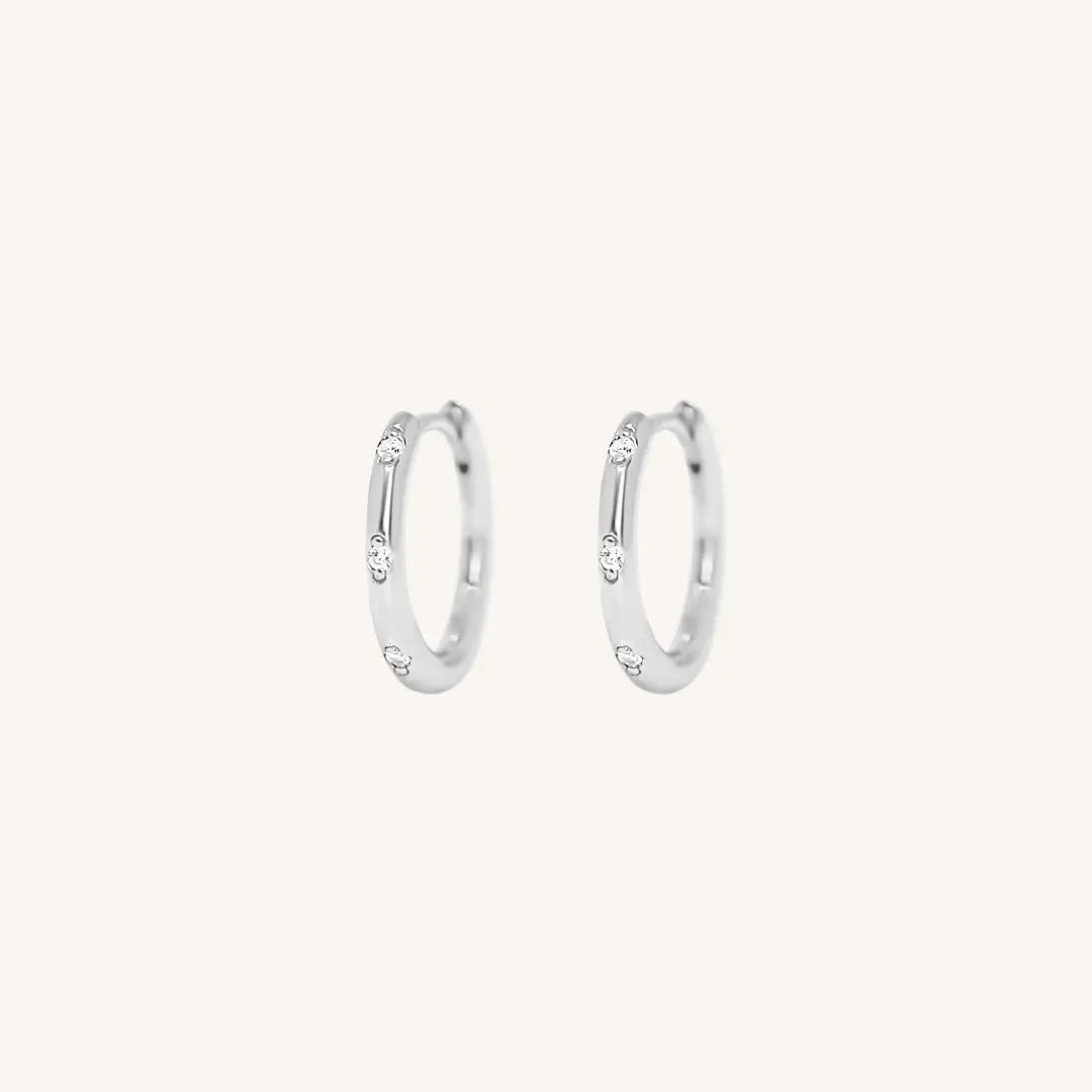 The  SILVER  Cruise Huggies by  Francesca Jewellery from the Earrings Collection.