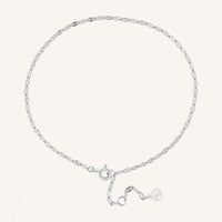 Silver anklet on a white background