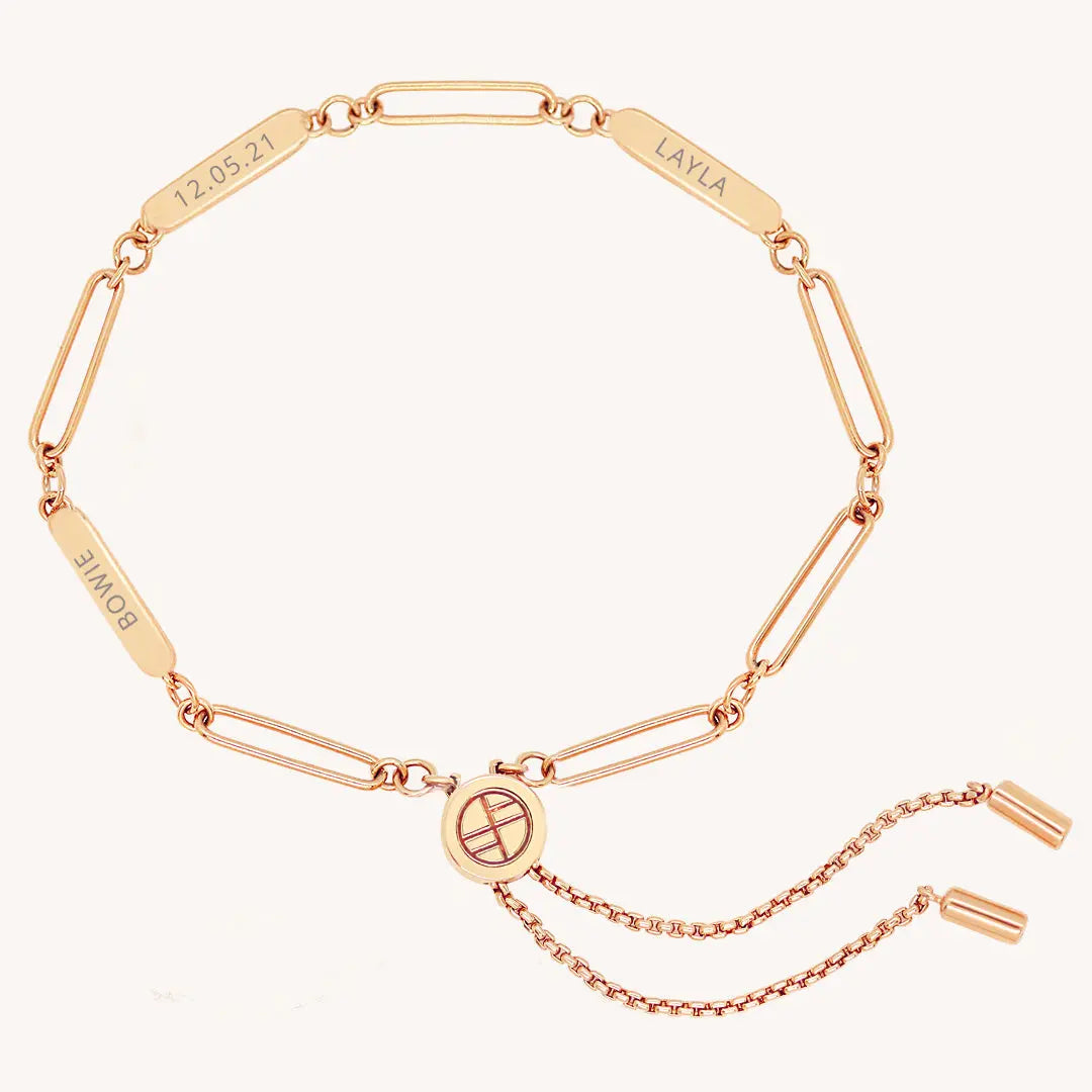 A rose Etch chain bracelet with three panels for engraving, featuring an adjustable fastening mechanism.