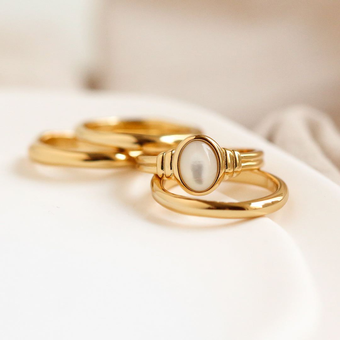Gold ring with a Mother of Pearl stone close up