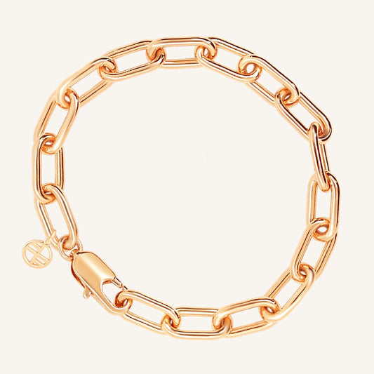A chunky link style bracelet in rose tone, featuring a clasp closure.