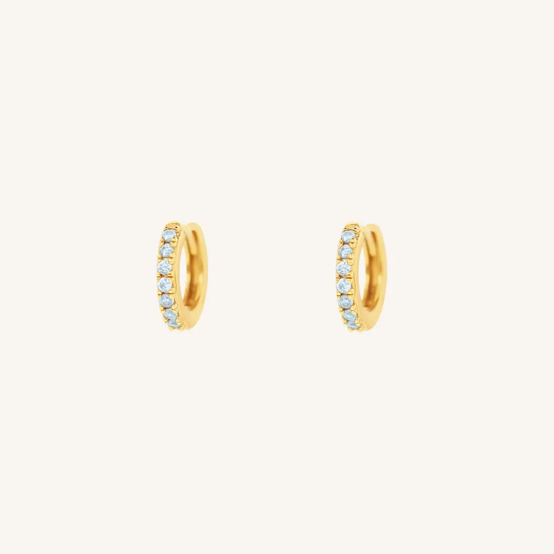 The  GOLD  Iris Huggies by  Francesca Jewellery from the Earrings Collection.