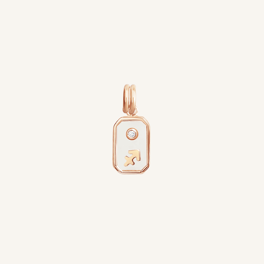 A rose gold iridescent zodiac charm representing the Sagittarius sign, with a loop for attachment on a chain