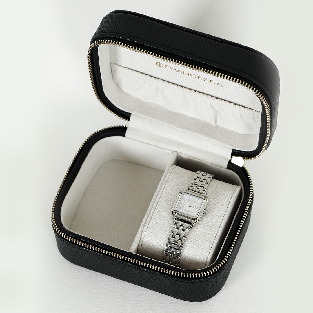 A silver-toned Louis Watch with a link bracelet and a square face featuring Roman numerals in watch box