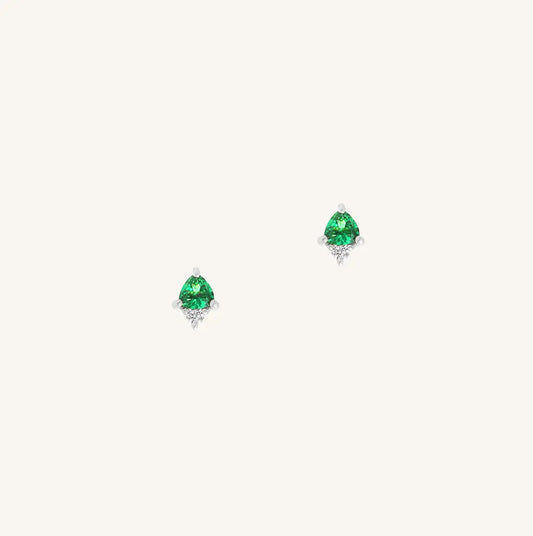 A silver pair of stud earrings featuring a green cubic zirconia, representing May.