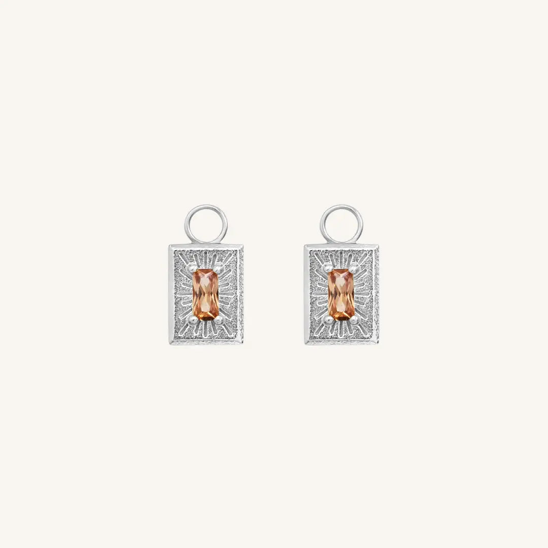 The  SILVER  Myall Hoop Charms Set of 2 by  Francesca Jewellery from the Earrings Collection.