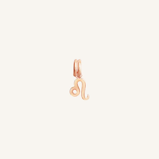 A rose gold Petite Zodiac Charm representing the Leo zodiac sign.